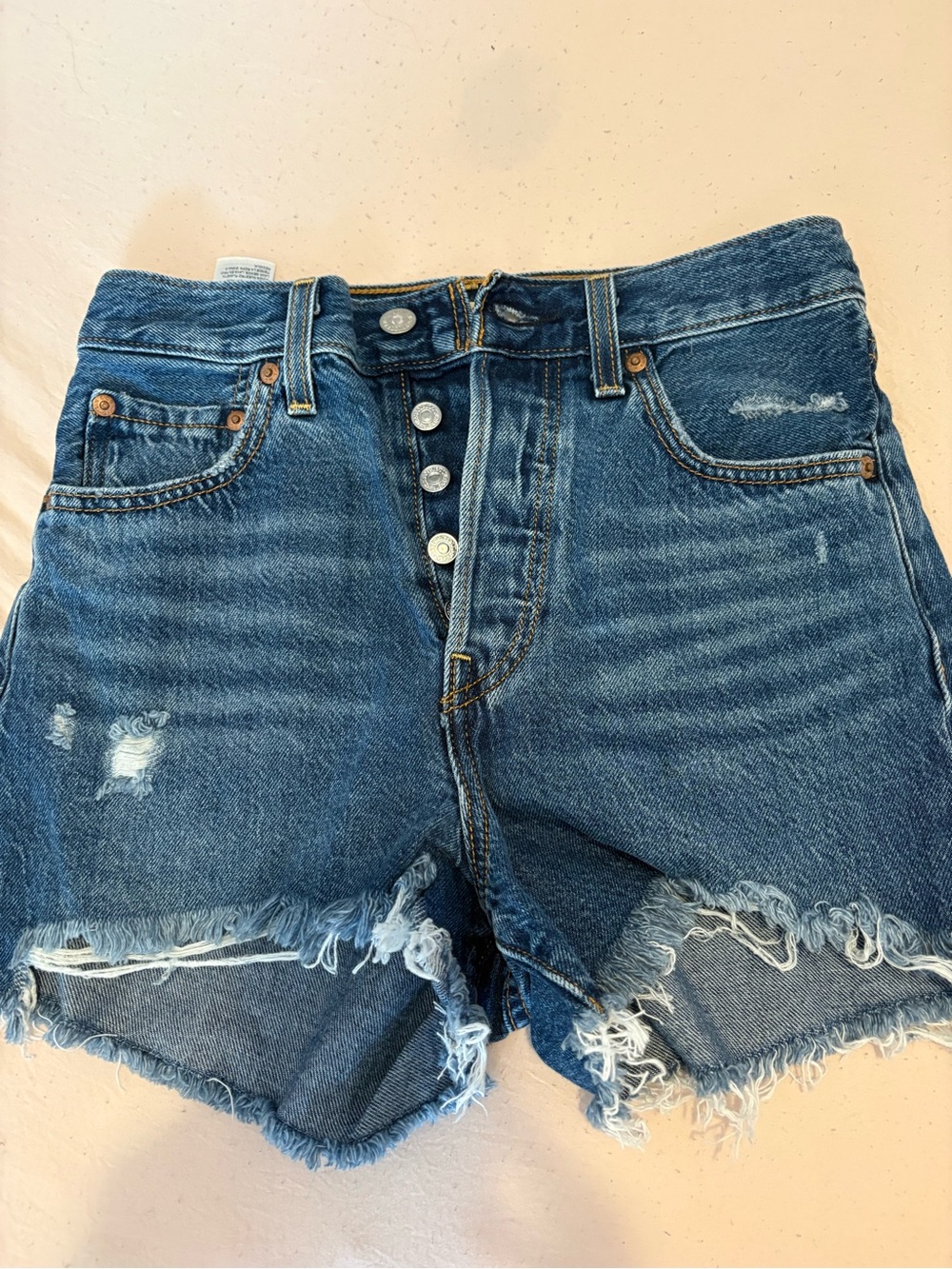 Leviβs Womenβs Distressed High-Rise Denim Shorts